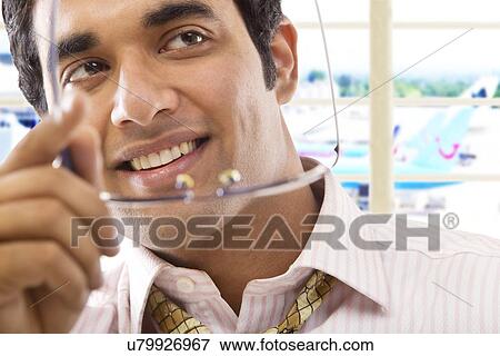 Stock Photo - Businessman with spectacles . Fotosearch