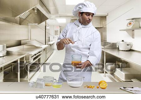 Chef with orange juice View Large Photo Image Stock Image - Chef with orange juice . Fotosearch