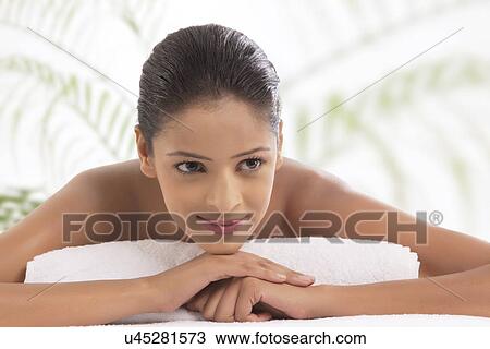 Close-up of beautiful woman at spa View Large Photo Image Stock Image - Close-up of beautiful woman at spa . Fotosearch