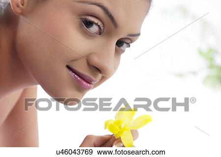 Stock Photo - Close-up of young woman smiling . Fotosearch