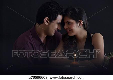 Stock Image - Couple celebrating Valentines Day. Fotosearch