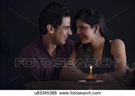 Couple celebrating Valentines Day View Large Photo Image Stock Photo - Couple celebrating Valentines Day. Fotosearch