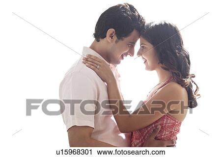 Couple embracing each other View Large Photo Image Stock Image - Couple embracing each other. Fotosearch