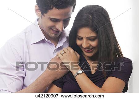 Couple embracing each other View Large Photo Image Stock Photo - Couple embracing each other. Fotosearch
