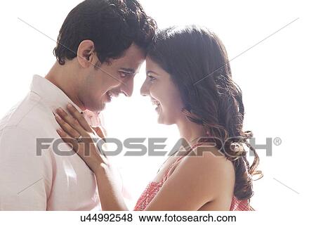 Stock Photo - Couple embracing each other. Fotosearch