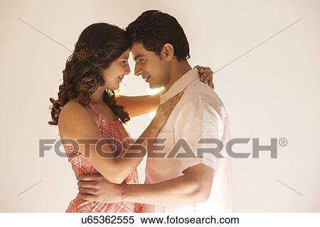 Stock Photography - Couple embracing each other. Fotosearch