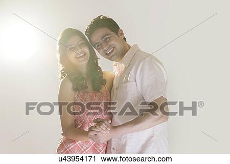 Couple holding each other View Large Photo Image Stock Image - Couple holding each other. Fotosearch