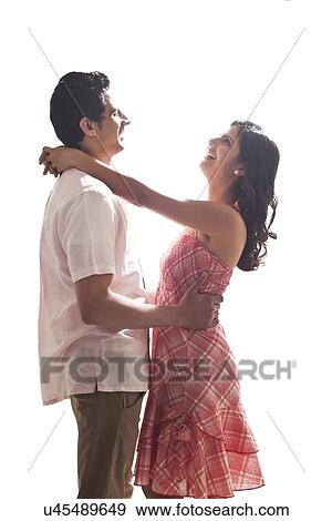 Couple holding each other View Large Photo Image Stock Photo - Couple holding each other. Fotosearch