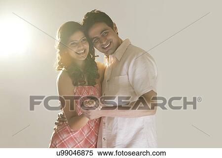 Stock Photography - Couple holding each other. Fotosearch