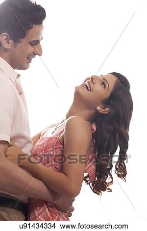 Picture - Couple laughing. Fotosearch