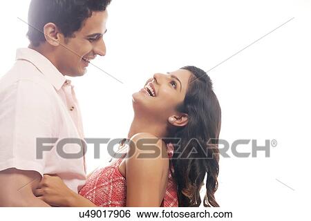Stock Photograph - Couple laughing. Fotosearch