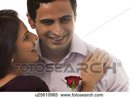Couple with a rose smiling View Large Photo Image Stock Photography - Couple with a rose smiling. Fotosearch