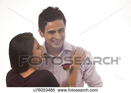 Couple with a rose View Large Photo Image Stock Photography - Couple with a rose. Fotosearch