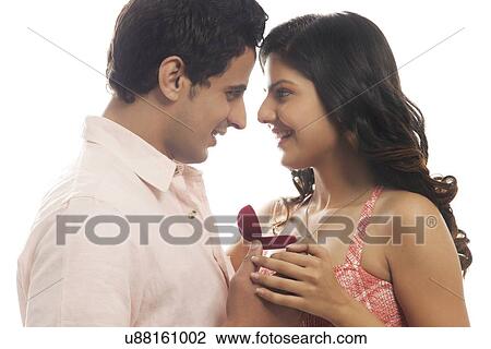 Couple with engagement ring View Large Photo Image Stock Image - Couple with engagement ring. Fotosearch
