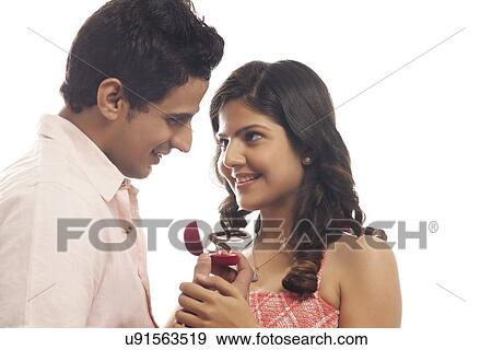 Couple with engagement ring View Large Photo Image Stock Photo - Couple with engagement ring. Fotosearch