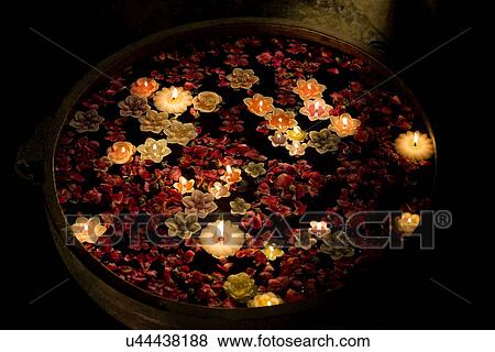 Diyas floating in an urn View Large Photo Image Stock Photo - Diyas floating in an urn . Fotosearch
