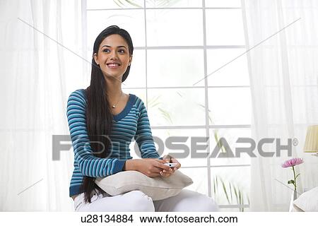 Girl with a mobile phone View Large Photo Image Picture - Girl with a mobile phone . Fotosearch