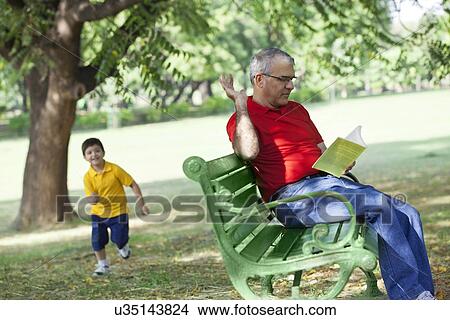 Grandfather calling his grandson View Large Photo Image Picture - Grandfather calling his grandson. Fotosearch