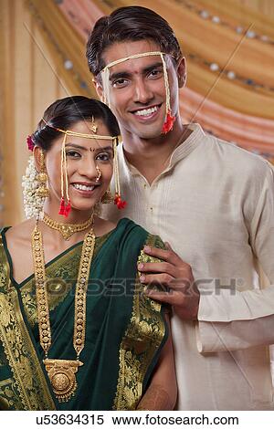 Stock Photography - Handsome young Maharashtrian couple smiling together . Fotosearch