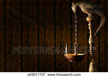 Hanging diya View Large Photo Image Stock Photo - Hanging diya . Fotosearch