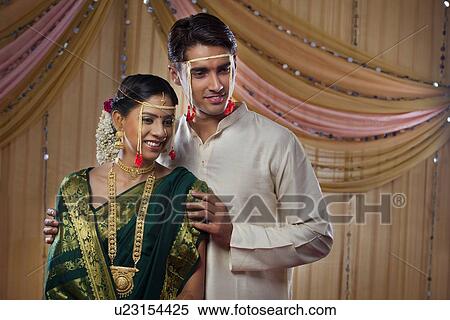 Stock Photography - Happy young Maharashtrian bride and groom . Fotosearch