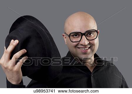 Homme Chauve Partir Sien Chapeau Banque D Image U98953741 Fotosearch