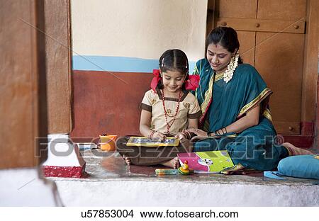 Little girl studying View Large Photo Image Picture - Little girl studying . Fotosearch