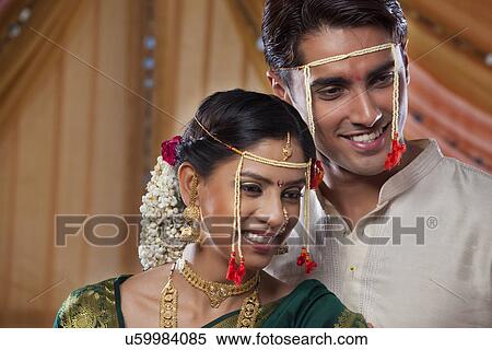 Stock Photography - Loving young Maharashtrian couple smiling together . Fotosearch