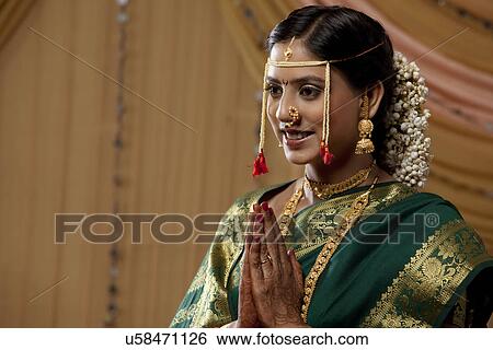 Maharashtrian bride greeting View Large Photo Image Stock Photograph - Maharashtrian bride greeting . Fotosearch