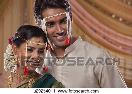 Maharashtrian young couple smiling together View Large Photo Image Stock Image - Maharashtrian young couple smiling together . Fotosearch
