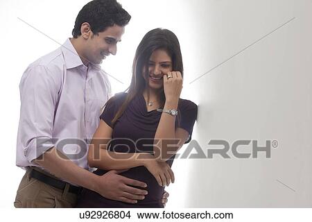 Man holding woman View Large Photo Image Picture - Man holding woman. Fotosearch