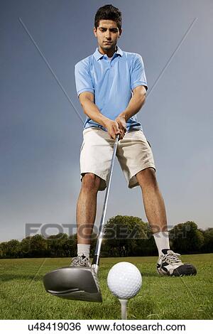 Man playing golf View Large Photo Image Stock Photograph - Man playing golf . Fotosearch