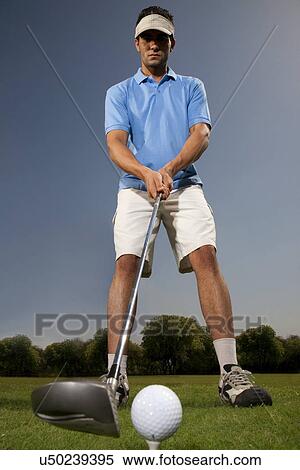 Stock Photography - Man playing golf . Fotosearch