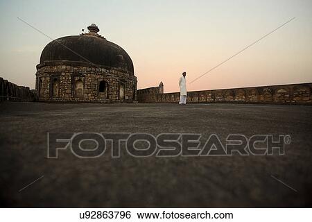 Man standing inside a fort View Large Photo Image Stock Photograph - Man standing inside a fort . Fotosearch