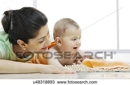 Mother with her baby View Large Photo Image Stock Image - Mother with her baby . Fotosearch