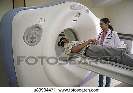 Patient getting an MRI View Large Photo Image Stock Image - Patient getting an MRI . Fotosearch
