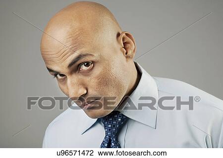Portrait of a bald man View Large Photo Image Stock Image - Portrait of a bald man . Fotosearch