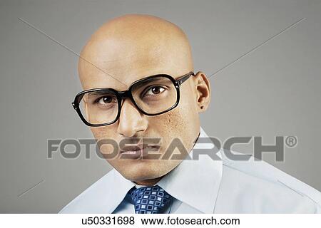 Portrait of a bald man View Large Photo Image Stock Photo - Portrait of a bald man . Fotosearch
