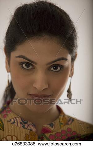 Stock Photograph - Portrait of a beautiful woman . Fotosearch
