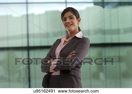 Portrait of a businesswoman smiling View Large Photo Image Stock Image - Portrait of a businesswoman smiling . Fotosearch
