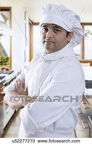 Stock Image - Portrait of a chef . Fotosearch