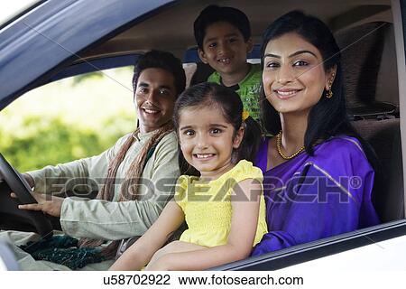Portrait of a family inside a car View Large Photo Image Stock Image - Portrait of a family inside a car . Fotosearch