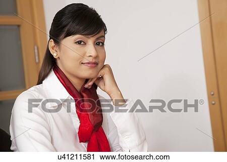 Stock Image - Portrait of a female business executive. Fotosearch