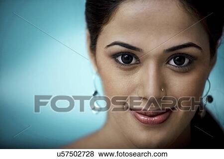 Stock Photo - Portrait of a girl smiling . Fotosearch