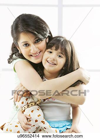 Picture - Portrait of a mother and daughter . Fotosearch