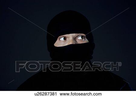 Portrait of a robber View Large Photo Image Stock Image - Portrait of a robber . Fotosearch