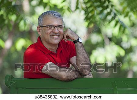 Portrait of a senior man smiling View Large Photo Image Stock Image - Portrait of a senior man smiling. Fotosearch