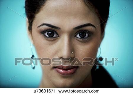Portrait of a serious girl View Large Photo Image Stock Image - Portrait of a serious girl . Fotosearch