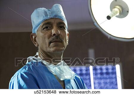 Stock Photo - Portrait of a surgeon . Fotosearch