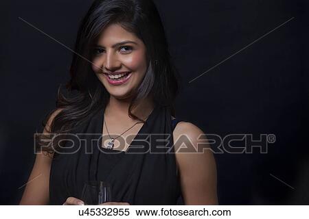 Stock Photography - Portrait of a woman smiling. Fotosearch